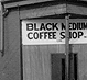 Thumbnail: Scanned photo of Black Medium Coffee Shop 
(detail).
