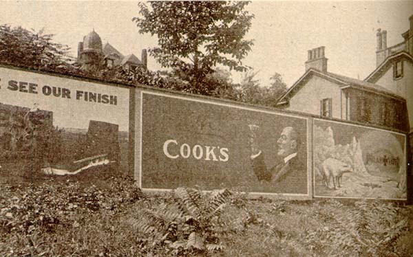 Scanned photo of billboards flanking Kindergarten College.