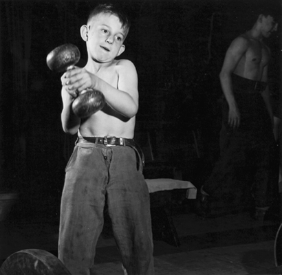 Photo_of_young_boy_lifting_weight.