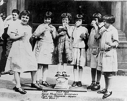 Photo_of_girls_drinking_milk_and_eating_crackers.