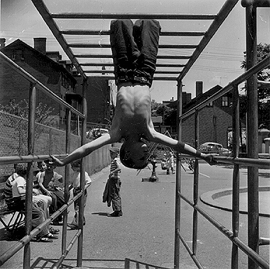 Photo_of_boy_on_monkey_bars.