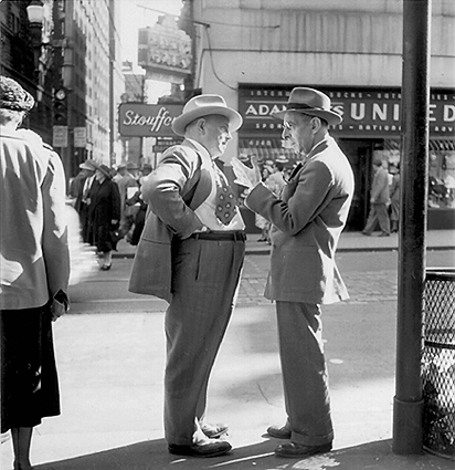 Scanned photo of a corner conversation.