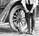 Thumbnail:_Photo_of_three_men_working_on_an_automobile_in_Schenley_Park_(detail).