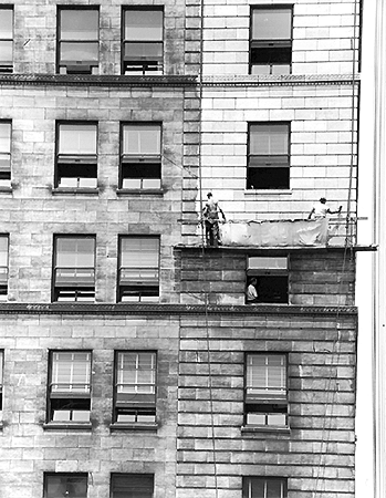 Photo_of_men_cleaning_the_Oliver_Building.