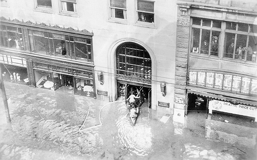 Scanned photo of Clark Building during 
flood.