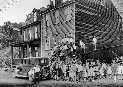 Scanned photo of Mt. Washington dwelling with children.